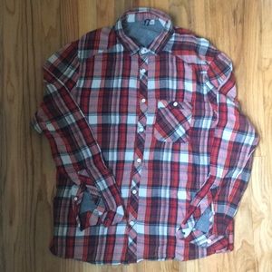 Men’s flannel shirt in red, white and navy blue.